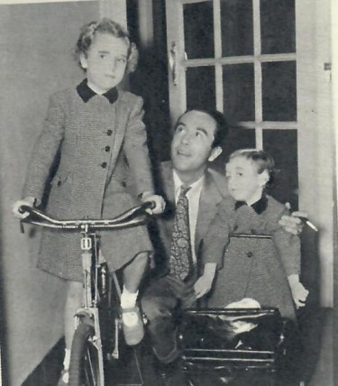 Dennis Price with his daughters
