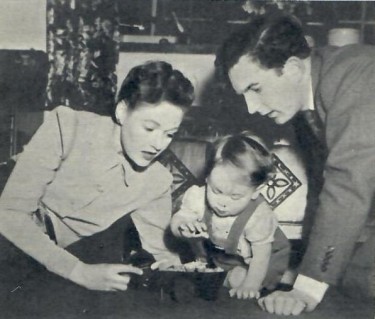 Rosamund John with her son and husband